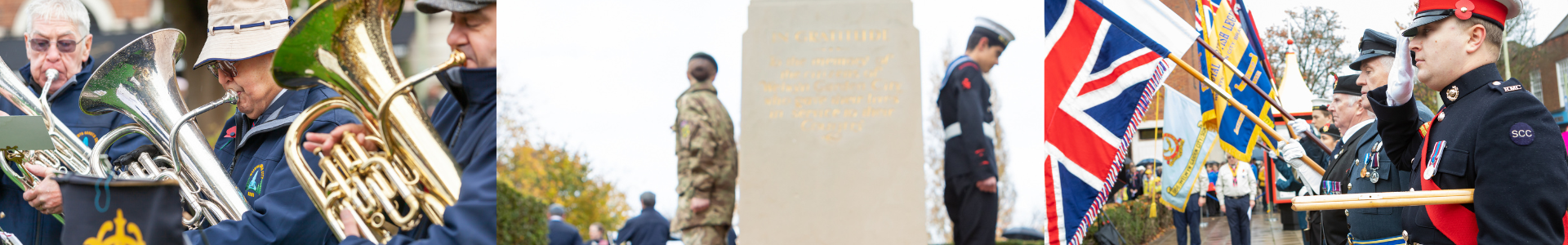 brass band, two armed forces people standing beside memorial, armed forces people holding flags