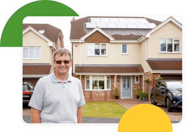 man outside house with solar panelling